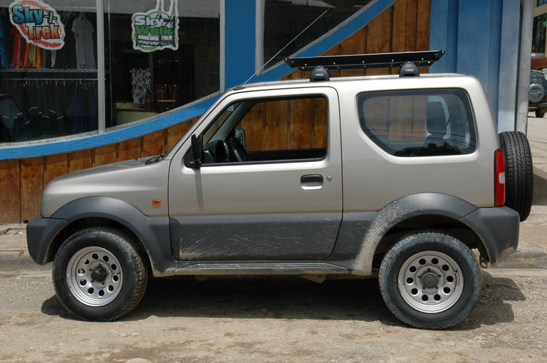 Our intrepid Suzuki Jimny, before it got dirty.  The 1500km we put on this car (it only had 1000km on it when we got it) in 9 days must have taken a good year out of its useful life.  We're sorry, Dollar rent-a-car.